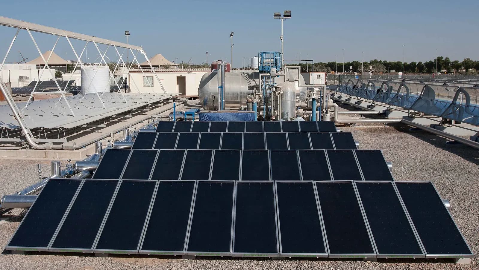 Rows of solar panels on ground mounts at a test site in Masdar City, Abu Dhabi