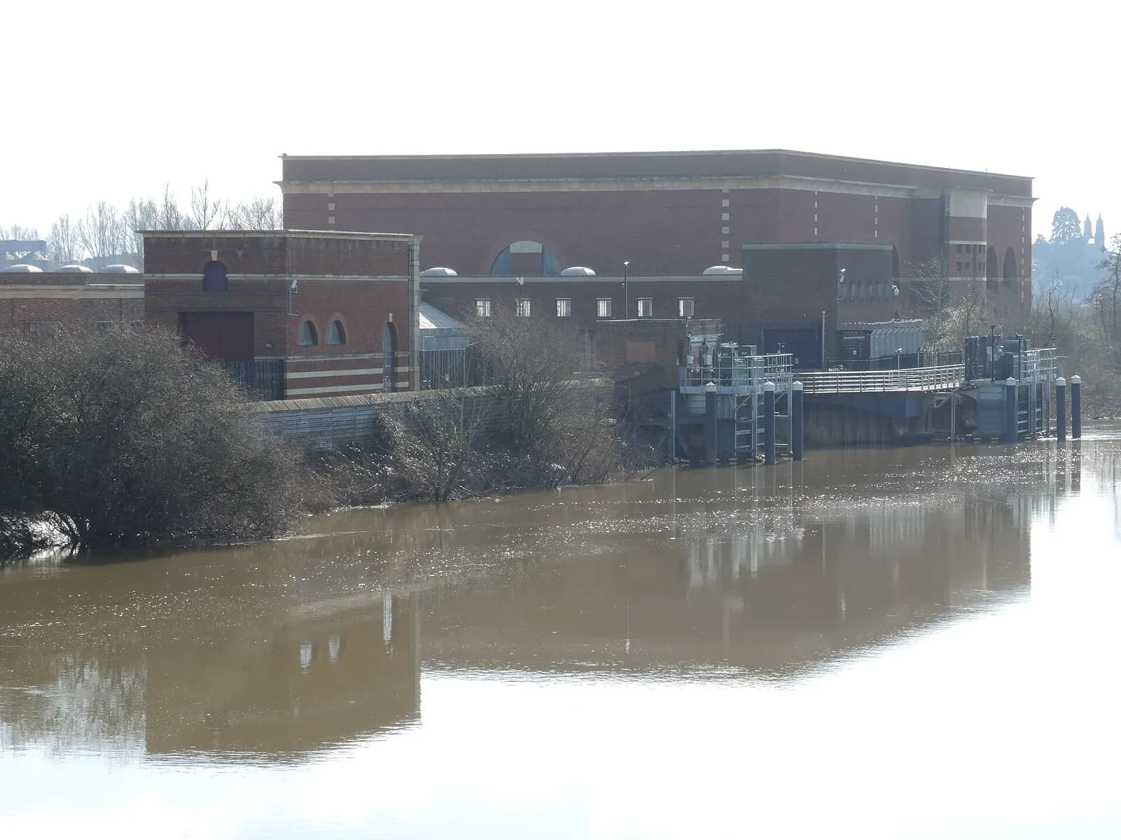 Brick buildings of Mythe Water Treatment Works beside the River Severn near Tewkesbury