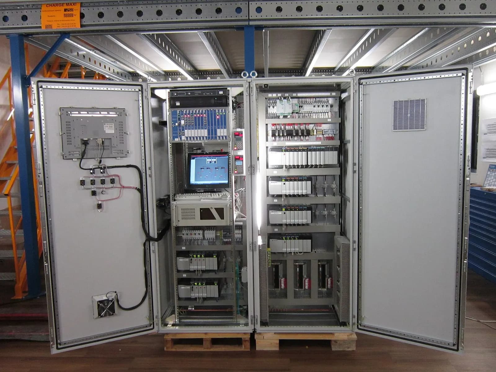 Open PLC control cabinet for a centrifugal compressor with an operator panel, controllers and wiring