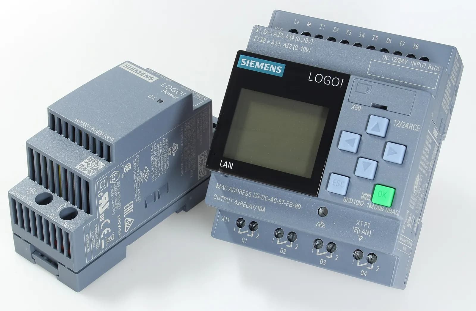 Siemens LOGO! 8 logic module with display and keypad beside its power supply unit