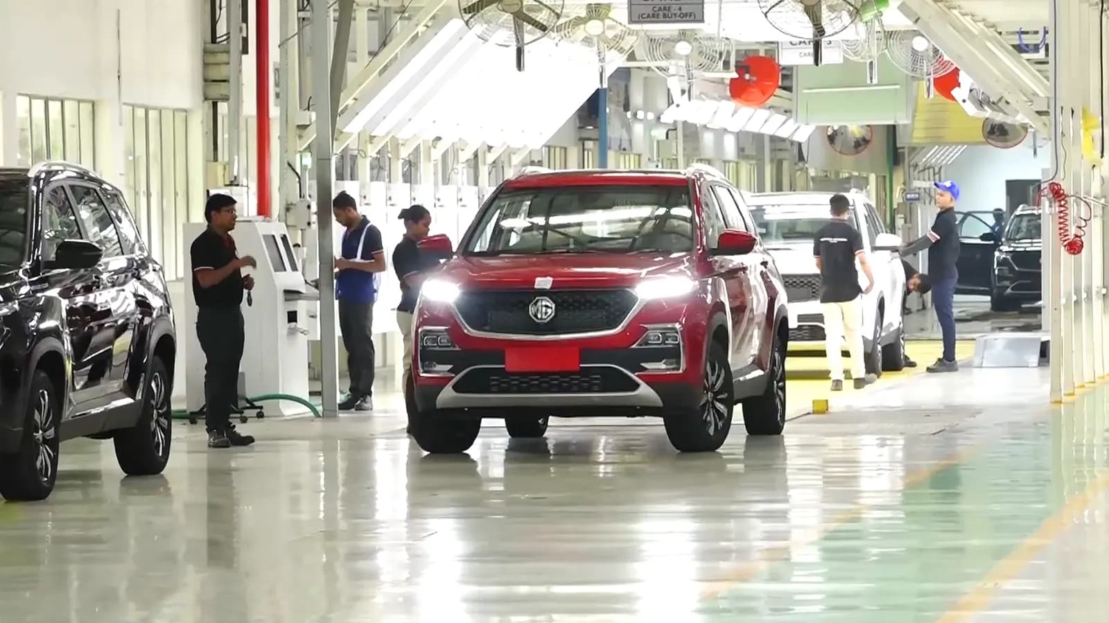 A red MG Hector SUV on the final inspection line inside the MG Motor India factory in Halol, Gujarat.